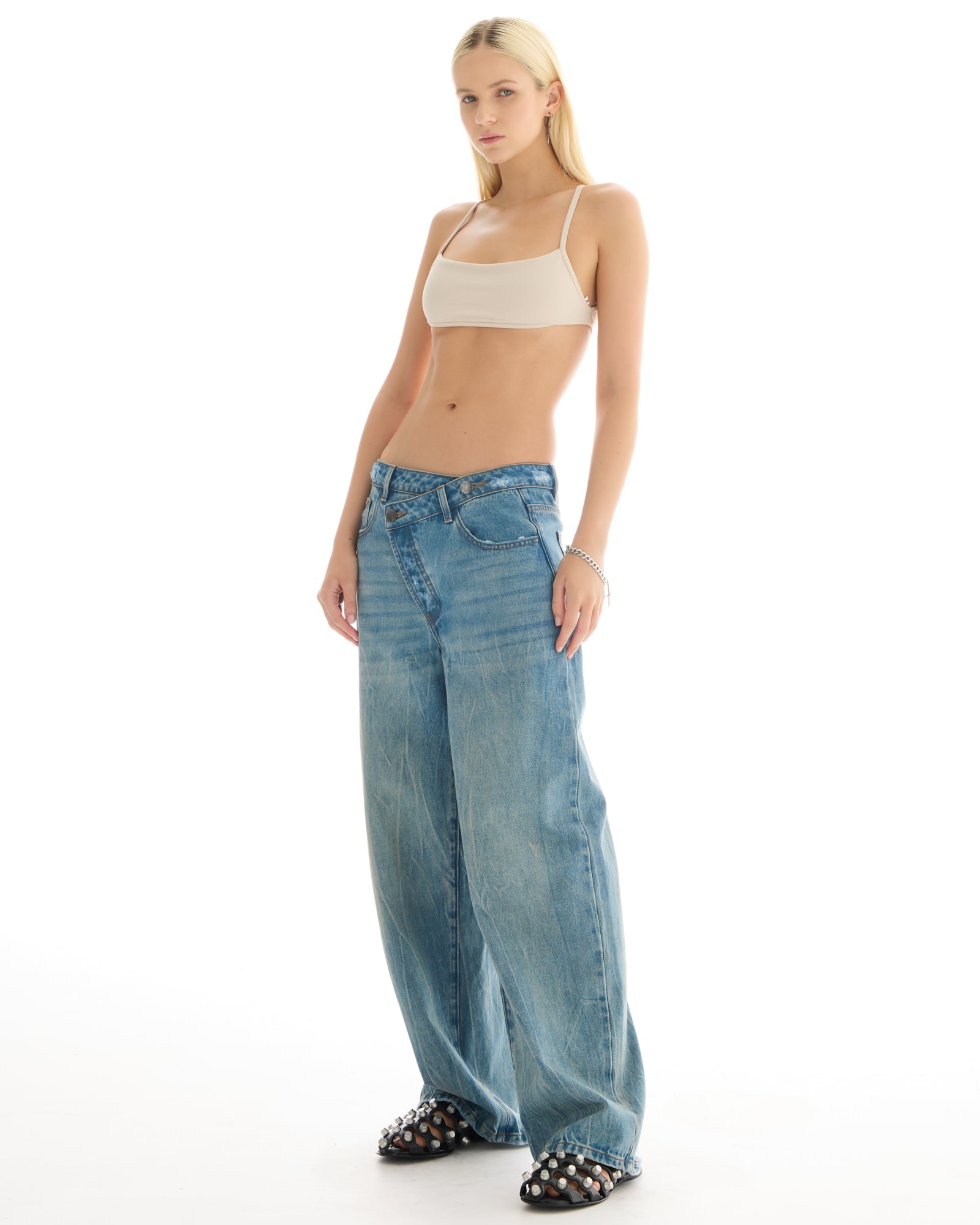 Cross Over Slouch Denim Jeans by THE TALES - product photo